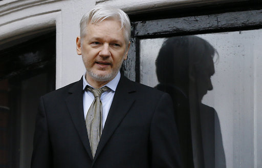 In this Feb. 5, 2016 file photo, WikiLeaks founder Julian Assange speaks from the balcony of the Ecuadorean Embassy in London. Two media reports say U.S. prosecutors are preparing or closely considering charges against the anti-secrecy group WikiLeaks, including  Assange, for revealing sensitive government secrets. (AP Photo/Kirsty Wigglesworth, File)