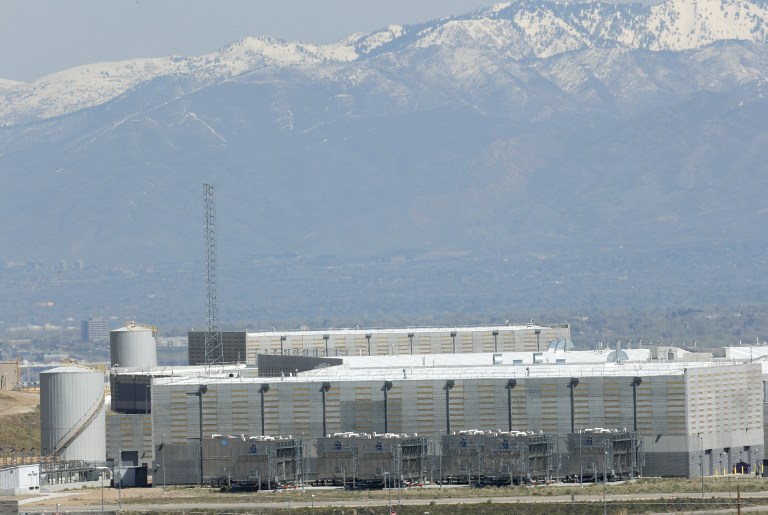 Security fences surround the National Security Agency's (NSA) Utah data collection center in Bluffdale, Utah near Salt Lake City on April 12, 2017.  The 1.5 billion USD data center, thought to be the largest in the world, with a reported size to be on the order of an exabytes or larger, supports the Comprehensive National Cybersecurity Initiative (CNIC) of the United States Government. / AFP PHOTO / GEORGE FREY