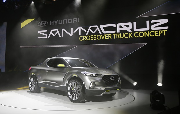 The Hyundai Santa Cruz crossover truck concept is unveiled during the North American International Auto Show, Monday, Jan. 12, 2015 in Detroit. (AP Photo/Carlos Osorio)