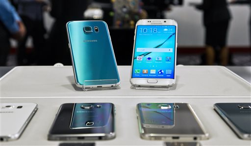 The new Samsung phones, Galaxy S6, top left, and Galaxy S6 Edge, top right, which were officially unveiled on March 1, 2015 on the eve of the Mobile World Congress wireless show in Barcelona, Spain. AP Photo