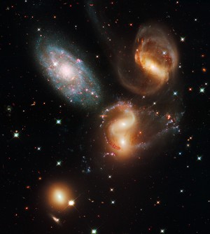 This image made by the NASA/ESA Hubble Space Telescope shows a group of five galaxies known as Stephan's Quintet. The Hubble Space Telescope, one of NASA'S crowning glories, marks its 25th anniversary on Friday, April 24, 2015. With more than 1 million observations, including those of the farthest and oldest galaxies ever beholden by humanity, no man-made satellite has touched as many minds or hearts as Hubble.   (NASA, ESA, Hubble SM4 ERO Team via AP)