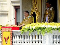 Thailand’s King Bhumibol Adulyadej, center, is accompanied by Crown Prince Vajiralongkorn  at the Ananta Samakhom Throne Hall in Bangkok. AP