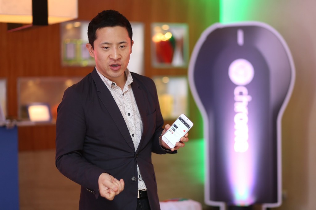 Mickey Kim, head of Asia-Pacific Partnerships for Chromecast, demonstrates to the media how the device is used during the press launch last Dec. 10. Photo courtesy of Google Philippines 
