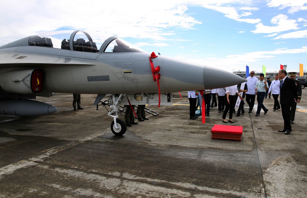 DECEMBER 05, 2015 President Benigno S. Aquino III accompanied by Defense Secretary Voltaire Gazmin,  Armed Forces of the Philippines Chief of Staff General Hernando Iriberri and Air Force Chief Jeffrey Delgado inspect the newly acquired air assets at the Villamor Air base in Pasay City saturday, December 5, 2015.  Earlier the President arrived from his working visit to France, Italy and Rome.  (Photo by Benhur Arcayan/Malacanang Photo Bureau)
