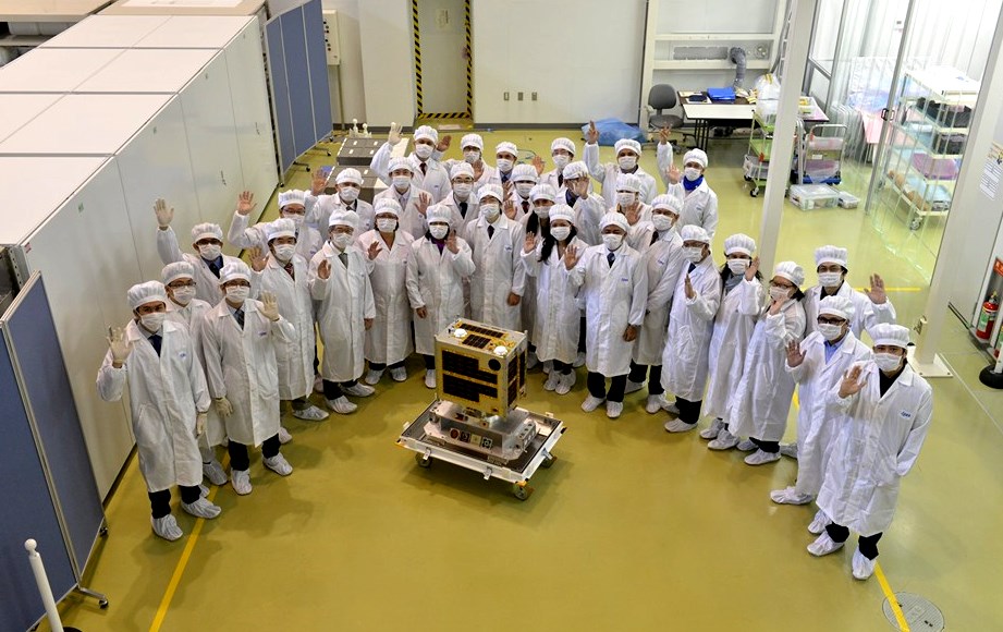DIWATA TURNOVER Filipino scientists from the University of the Philippines and Department of Science and Technology officials turn over the first Philippine microsatellite called Diwata 1 to their counterparts at Japan Aerospace Exploration Agency (Jaxa) in Tsukuba City. PHOTO COURTESY OF DOST