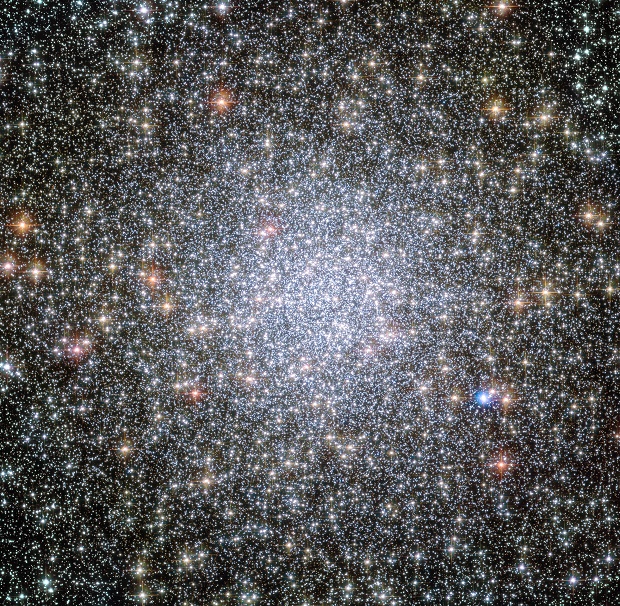 This undated image made available by NASA shows the globular star cluster 47 Tucanae photographed by the Hubble Space Telescope. On Wednesday, Jan. 6, 2016, Rosanne DiStefano of the Harvard-Smithsonian Center for Astrophysics in Cambridge, Mass., said that clusters of stars on the fringes of our Milky Way galaxy may be home to intelligent life. DiStefano presented her theory at the American Astronomical Society's annual meeting in Kissimmee, Fla. AP FILE PHOTO
