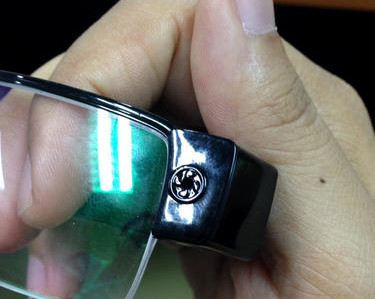In this Sunday May 8, 2016 photo by Asst.Prof.Pakarat Jumpanoi, shows a set of glasses with a hidden camera used by students caught cheating in exams for admission to medical and dental faculties in Bangkok, Thailand. Glasses with embedded cameras and smartwatches with stored information seem like regular spy equipment for the likes of James Bond, but to three students applying to medical school in Thailand, they were high-technology cheating devices. ( Asst.Prof.Pakarat Jumpanoi/Rangsit University via AP)