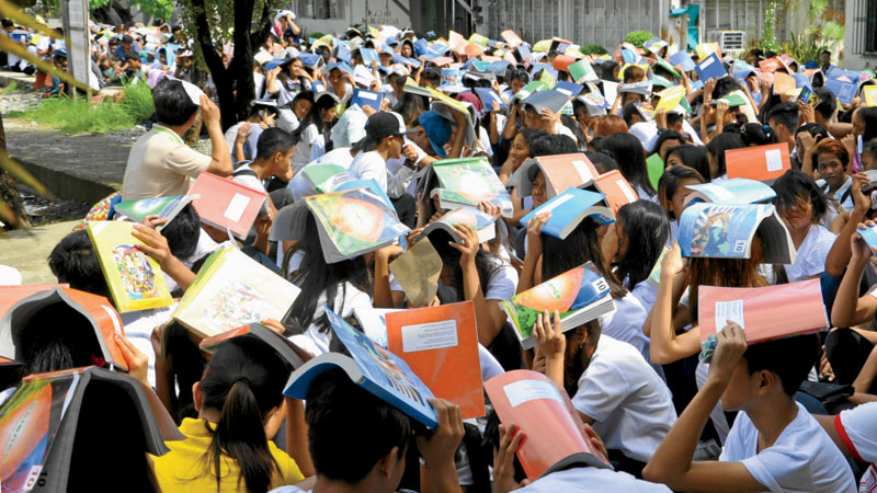 QUAKE DRILL Students of Dagupan City National High School join last week’s nationwide simultaneous quake drill. A new app being developed by the Philippine Institute of Volcanology and Seismology provides mobile access to information about fault line sites for drawing up disaster preparedness programs. WILLIE LOMIBAO/INQUIRER NORTHERN LUZON