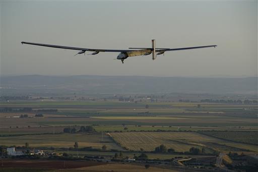 In this photo provided by Solar Impulse 2, the solar powered plane, piloted by Swiss pioneer Bertrand Piccard, prepares to land in Seville in Spain Thursday, June 23, 2016. Swiss officials say an experimental solar-powered airplane has completed a three-day flight across the Atlantic in the latest leg of its globe-circling voyage. The Aero-Club of Switzerland said the Solar Impulse 2 landed in Seville in southern Spain at 0540 GMT on Thursday, ending a 70-hour flight which began from New York City on Monday. (Jean Revillard/Solar Impulse 2 via AP)  