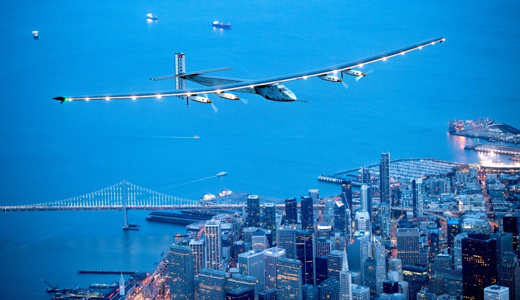 FILE - In this April 23, 2016 file photo, Solar Impulse 2 flies over San Francisco. The solar-powered airplane has left Pennsylvania for New York City on the latest leg of its globe-circling voyage. The Swiss-made Solar Impulse 2 took off from Lehigh Valley International Airport late Friday, June 10, 2016.  (AP Photo/Noah Berger, File)
