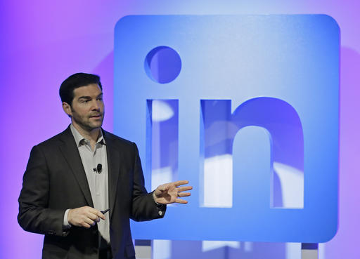 In this Sept. 22, 2016 file photo, LinkedIn CEO Jeff Weiner speaks during a product announcement at his company's headquarters in San Francisco. LinkedIn, which calls itself the social network for professionals, is adding a service that provides members with pay information for a variety of jobs, including a break-down by such factors as location, industry, education and experience. It’s based on anonymized data submitted by LinkedIn members, including details about base pay and other compensation, such as bonuses and stock grants. (AP Photo/Eric Risberg)