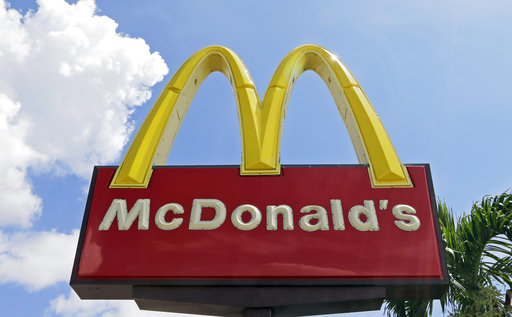 This Tuesday, June 28, 2016, file photo shows a McDonald's sign at one of the company's restaurants in Miami. On Thursday, March 16, 2017, McDonald's said it has been notified by Twitter that its account was "compromised" after it appeared to send a message calling Donald Trump "a disgusting excuse of a President." AP FILE PHOTO