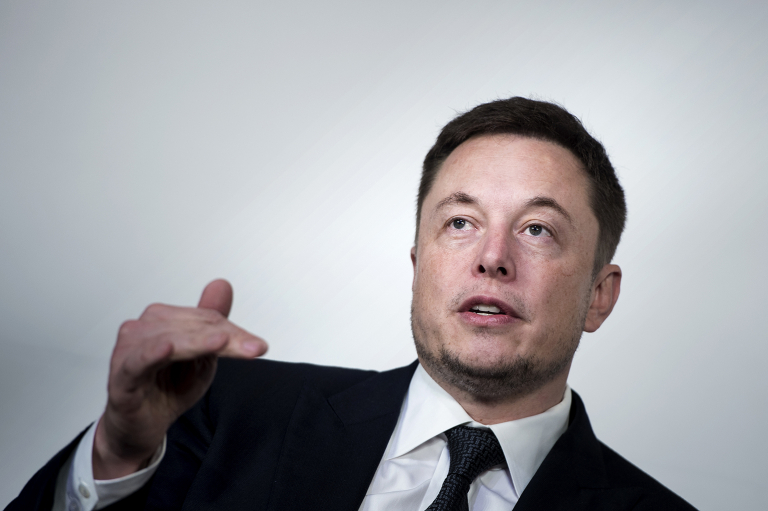 Tesla chief Musk calls on workers to help deliver cars