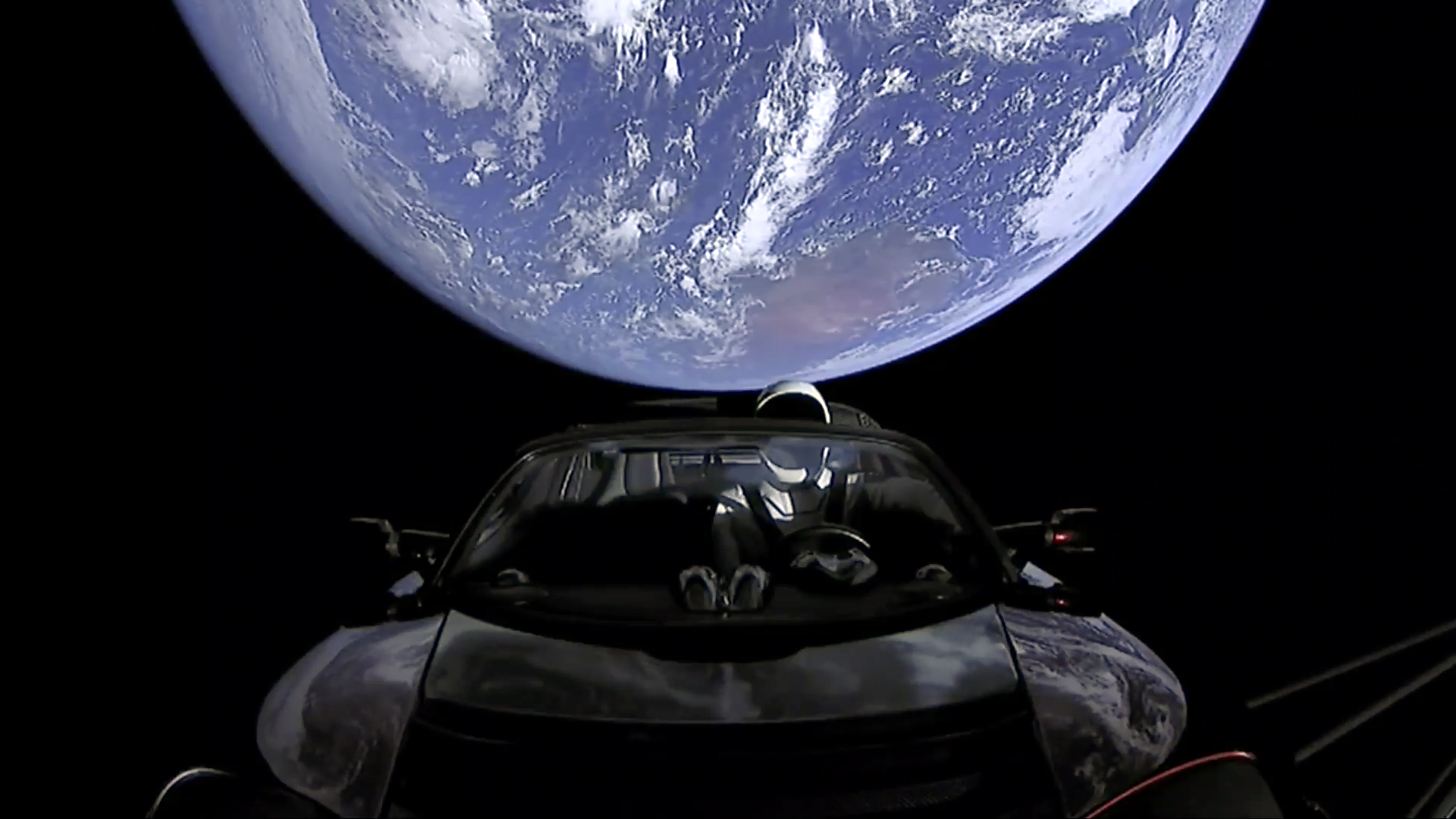 Tesla Roadster в космосе. Илон Маск Тесла в космосе. Илон Маск машина в космосе. Space car