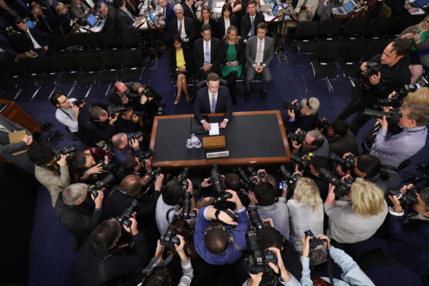 FILE - In this April 10, 2018, file photo, Facebook CEO Mark Zuckerberg arrives to testify before a joint hearing of the Commerce and Judiciary Committees on Capitol Hill in Washington, about the use of Facebook data to target American voters in the 2016 election. We may remember 2018 as the year in which technology’s dystopian potential became clear, from Facebook’s role enabling the harvesting of our personal data for election interference to a seemingly unending series of revelations about the dark side of Silicon Valley’s connect-everything ethos. (AP Photo/Pablo Martinez Monsivais, File)