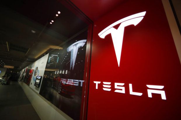 Tesla walks back its plan to close most showrooms