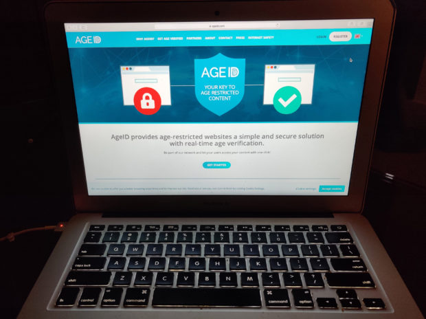 This photo taken in London on Monday July 8, 2019, shows a laptop screen displaying the website for AgeID, an age verification system for the British government’s planned online “porn block". The British government wants to require porn websites to verify their users are adults. The effort is being watched by other countries hoping to better regulate pornographic content but has raised concerns about privacy, censorship and competition. It has run into multiple delays that reflect the confusion surrounding it. (AP Photo/Kelvin Chan)