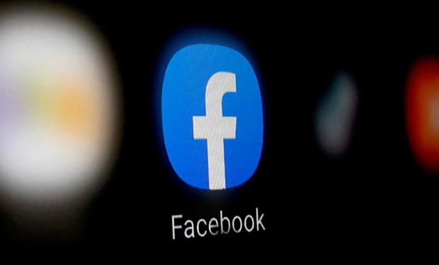 FILE PHOTO: A Facebook logo is displayed on a smartphone in this illustration taken January 6, 2020. REUTERS/Dado Ruvic/Illustration