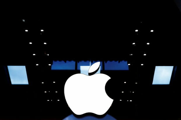 FILE PHOTO: Apple logo is seen on the Apple store at The Marche Saint Germain in Paris, France July 15, 2020.  REUTERS/Gonzalo Fuentes