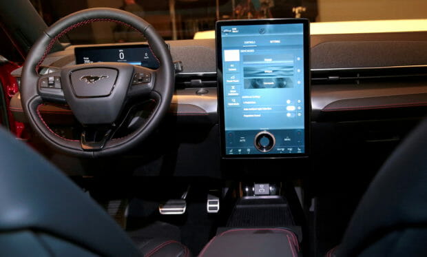 FILE PHOTO: Ford Motor Co's next generation SYNC 4 communications and entertainment system on a 15.5" touchscreen display screen is seen in the interior of Ford's all-new electric Mustang Mach-E vehicle at a studio in Warren, Michigan, U.S., October 29, 2019.   REUTERS/Rebecca Cook