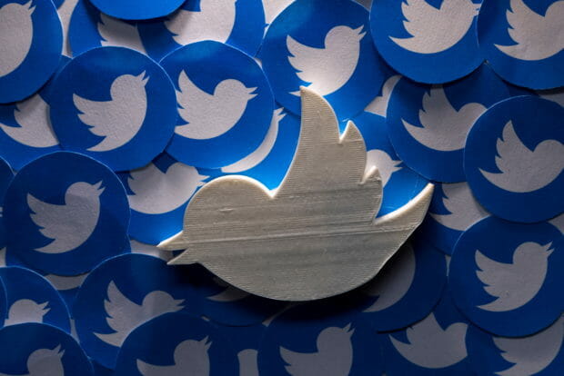 FILE PHOTO: A 3D-printed Twitter logo on non-3D printed Twitter logos is seen in this picture illustration taken April 28, 2022. REUTERS/Dado Ruvic/Illustration