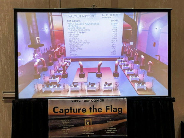 A virtual leaderboard showing the scores and rankings of participating teams is displayed in the Capture the Flag (CTF) contest room at DEF CON hacking conference in Las Vegas, Nevada, U.S., August 13, 2022. REUTERS/Zeba Siddiqui