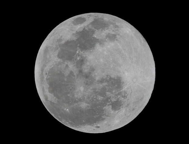 FILE PHOTO: A full moon is seen over Mexico City