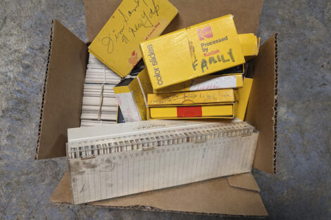 This August 2023 photo shows one of the boxes of photographic slides that AP Technology Writer Michael Liedtke inherited from his father, James. Old photos can be a treasure that keeps on giving — if you can get them out of boxes and drawers and get at them. That's where digitization comes in. 
