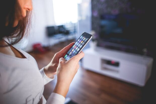 Person checking her smart phone