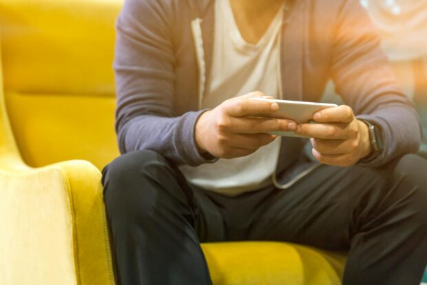 Illustration depicting someone fixing mobile data on their smartphone.