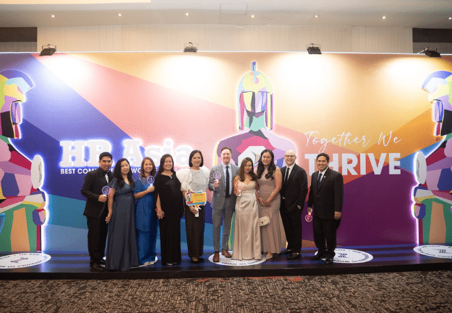 Executives of Filipino-owned IT-BPM company Pointwest receive their first HR Asia Best Workplaces To Work For in the Philippines award